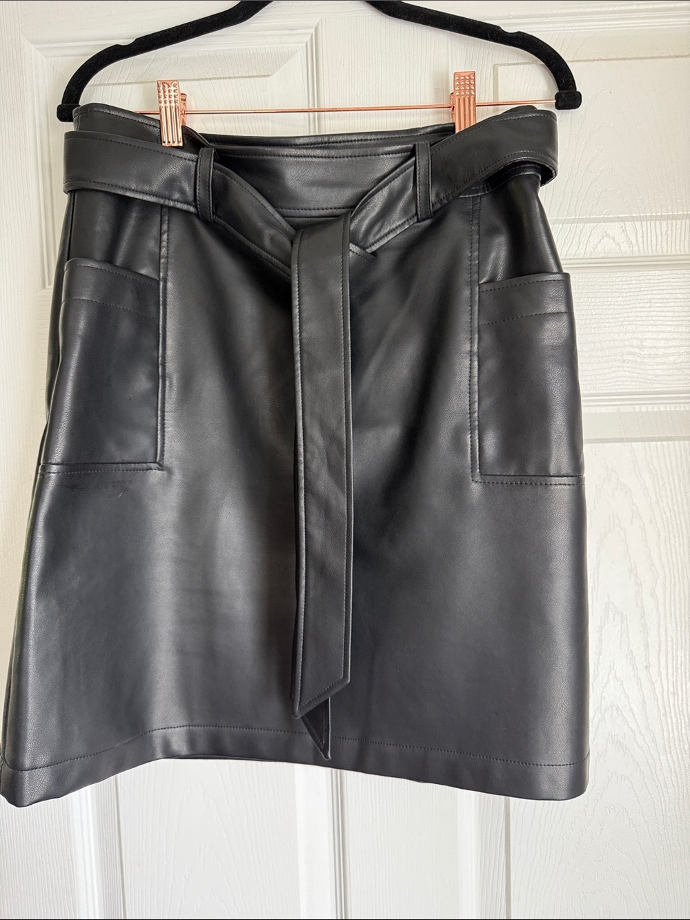 Mini leather skirt with belt